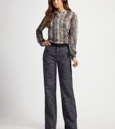 Its unique print perfectly complements its delicate fabrication and henley-inspired design.Button placketLong sleevesButtoned cuffsAbout 25 from shoulder to hemSilkMade in USA of imported fabricDry clean