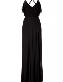 Glamorous, floor-length evening gown of fine black silk - Features ruffle trim at the neckline, decorative crystal-studded carrier, and deep, sexy back with crossed strapped - Pleats and mini train create refined, luxurious look - Wear with sandals and matching clutch