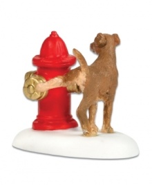 Just the thing for outside a Department 56 fire station, this porcelain figurine depicts a frisky pup marking his territory on an irresistible red hydrant.