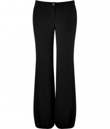 These classic wide leg pants feature an elasticized cuff for a cool, cutting-edge flowing silhouette -Zip with button closure, belt loops, relaxed silhouette, elasticized cuffs - Style with a fitted blouse, a bold shoulder blazer, and platform pumps