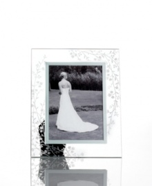 Keep memories fresh. Etched with cascading florals, the glass Trousseau picture frame from Martha Stewart Collection gives special moments a romantic sensibility. Keep memories fresh. Etched with cascading florals, the glass Trousseau picture frame from Martha Stewart Collection gives special moments a romantic sensibility.