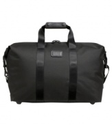 The ideal companion for overnight trips or last-minute getaways, this satchel reveals a roomy compartment with zip pocket and key hook, so you have all you need, nothing to weigh you down and a world of possibilities ahead. Tumi quality assurance warranty.
