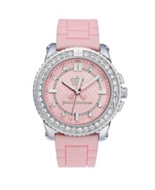 Distinguish yourself as a perfectly girlie girl. Pedigree watch by Juicy Couture crafted of pink synthetic jelly strap and round stainless steel case. Bezel crystallized with Swarovski elements. Textured pink dial features stick indices, dot markers, minute track, three hands and crown logo. Quartz movement. Water resistant to 30 meters. Two-year limited warranty.