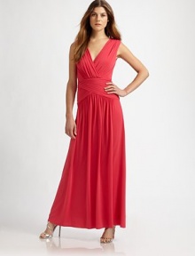 Soft, fluid jersey, in a floor-length style featuring a prettily cutout back.Surplice necklineSleevelessRuched waistbandGathered skirtBack cutout with hook-and-eye closuresConcealed back zipAbout 41¾ from natural waist73% acetate/20% nylon/7% spandexDry cleanImportedModel shown is 5'10 (177cm)wearing US size Small. Soft, fluid jersey, in a floor-length style featuring a prettily cutout back.Surplice necklineSleevelessRuched waistbandGathered skirtBack cutout with hook-and-eye closuresConcealed back zipAbout 41¾ from natural waist73% acetate/20% nylon/7% spandexDry cleanImportedModel shown is 5'10 (177cm)wearing US size Small.