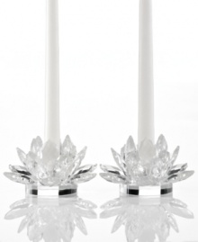 Votives in bloom. Lighting by Design Lotus blossoms brighten your home with warm, flickering candlelight and the resplendent shine of faceted crystal. A stunning pair for the dining room or holiday table.