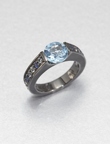 A simple, square-edged band is channel-set with an icy cool mix of blue sapphire, white topaz and blue topaz stones, creating an elegant showcase for a faceted pastel blue topaz.Sapphires, white topaz and blue topazBlack rhodium-plated sterling silverWidth, about .7Imported A simple, square-edged band is channel-set with an icy cool mix of blue sapphire, white topaz and blue topaz stones, creating an elegant showcase for a faceted pastel blue topaz.Sapphires, white topaz and blue topazBlack rhodium-plated sterling silverWidth, about .7Imported