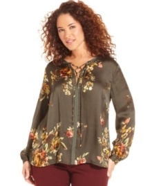 Lend a touch of romance to your style with Jones New York Signature's long sleeve plus size blouse, featuring a lace-up neckline and floral-print.