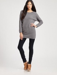 Comfy-chic, wool-rich boatneck in a slouchy silhouette with long dolman sleeves. Rolled boatneckLong dolman sleevesAbout 30 from shoulder to hem56% extra-fine merino wool/25% angora/18% nylon/1% spandexDry cleanImported