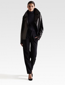 The distinctive motorcycle silhouette, slightly oversized and crafted from sleek bonded leather.Oversized notch collarDropped collarAsymmetric front zipperZip cuffsAbout 23 from shoulder to hemLeatherBonding: woolDry clean by a leather specialistMade in ItalyModel shown is 5'10 (177cm) wearing US size Small. The distinctive motorcycle silhouette, slightly oversized and crafted from sleek bonded leather.Oversized notch collarDropped collarAsymmetric front zipperZip cuffsAbout 23 from shoulder to hemLeatherBonding: woolDry clean by a leather specialistMade in ItalyModel shown is 5'10 (177cm) wearing US size Small.