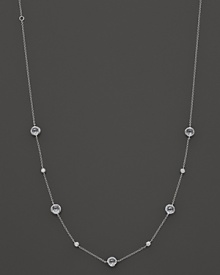 Stations of diamonds and clear quartz dot a sterling silver chain. By Ippolita.