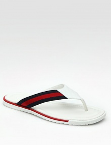Leather thong sandal with signature blue/red/blue web detail and micro guccissima trim. Rubber sole Made in Italy Leather thong sandal with signature blue/red/blue web detail and micro guccissima trim. Rubber sole Made in Italy