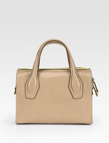 The ultimate lady-like bag made of rich, smooth leather, finished with structured top handles and vibrant accents. Double top handles, 5½ dropTop zip closureProtective metal feetOne inside zip pocketTwo inside open pocketsFully lined11¾W X 8H X 4½DMade in Italy The ultimate lady-like bag made of rich, smooth leather, finished with structured top handles and vibrant accents. Double top handles, 5½ dropTop zip closureProtective metal feetOne inside zip pocketTwo inside open pocketsFully lined11¾W X 8H X 4½DMade in Italy