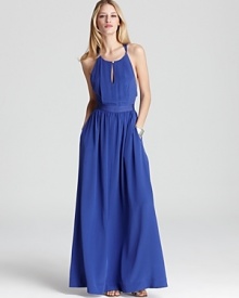 Thrown over a swimsuit or teamed with strappy sandals, this Juicy Couture maxi dress makes for easy elegance.