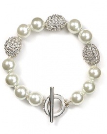 Lauren by Ralph Lauren's toggle bracelet is an eye-catching take on pearls. With crystal-encrusted stations, this statement strand is a fine finish to a cocktail dress and heels.