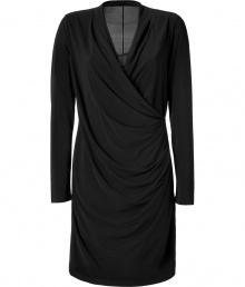 Luxurious dress in a black viscose blend - Cool, really simple cut - with a discreet eye-catcher - The key to the dress is the frontal draping which looks like yards of looped fabric - Softly falling V-neckline - Long, slim sleeves - Loose cut on the figure - Sexy but no skin showing, plays elegantly around the figure - Classic knee length - A dream dress for many (elegant) occasions, makes you look nice and thin, pleasant to wear and wonderfully comfortable -  Wear with black, gold or silver pumps or strappy sandals and chandelier earrings