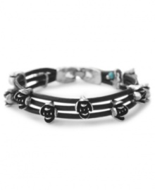 A charming leather bracelet by Lucky Brand. This woven design adds charm with semi-precious turquoise stones and beads set in floral-shaped silver tone mixed metal. Crafted in woven brown leather. Approximate length: 7-1/2 inches.