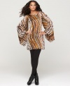 Voluminous sleeves and a spunky print make One World's dress a show-stopper! Pair with heels, booties or over-the-knee boots for a dramatic look.
