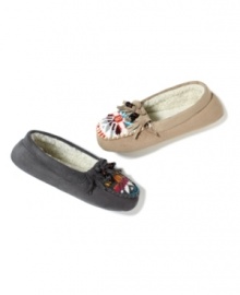 Slip into something completely cozy with these plush moccasin slippers from Steve Madden, featuring a southwest-inspired design with fringe and bead accents. Slip into something completely cozy with these plush moccasin slippers from Steve Madden, featuring a southwest-inspired design with fringe and bead accents.