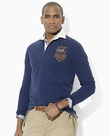 Engrained in athletic heritage, a trim-fitting rugby shirt is crafted from soft, washed cotton jersey with an embroidered crest for well-worn, authentic style Engrained in athletic heritage, a trim-fitting rugby shirt is crafted from soft, washed cotton jersey with an embroidered crest for well-worn, authentic style