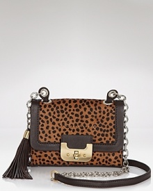 Get spotted sporting this compact crossbody bag from DIANE von FURSTENBERG. We're wild for it's trend right size and coolly rich accents. Get spotted sporting this compact crossbody bag from DIANE von FURSTENBERG. We're wild for it's trend right size and coolly rich accents.
