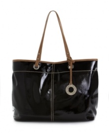 In a glossy patent finish, the One Stop Shopper purse looks great going anywhere, and holds plenty of stuff for a busy day of errands. In a glossy patent finish, the One Stop Shopper purse looks great going anywhere, and holds plenty of stuff for a busy day of errands.