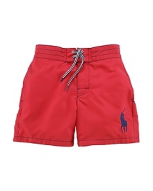 An embroidered Big Pony gives a heritage look to a brightly hued swim trunk in soft, lightweight woven cotton. An embroidered Big Pony gives a heritage look to a brightly hued swim trunk in soft, lightweight woven cotton.