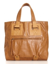 Ideal for either work or play, this tote by KDNY by Kelsi Dagger has an easy-going downtown appeal. Defined stitching and goldtone hardware perfectly accent this sleek design. Ideal for either work or play, this tote by KDNY by Kelsi Dagger has an easy-going downtown appeal. Defined stitching and goldtone hardware perfectly accent this sleek design.