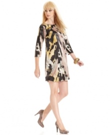 A deep V-backline adds eye-catching appeal to this MM Couture painterly-print shift dress -- pair it with stiletto booties for an edgy look!