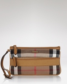 Perfect the day-to-night downsize with this checked accessory from Burberry. It boasts the brand's classic print, yet in a wrist-friendly shape that's wholly modern. Perfect the day-to-night downsize with this checked accessory from Burberry. It boasts the brand's classic print, yet in a wrist-friendly shape that's wholly modern.
