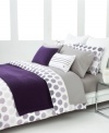 Spot on. Lined dots in shades of purple give this Lacoste duvet cover set a decidedly mod appeal. Self-reversing; finished with a solid piped edge.