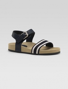 A striped webbed strap in front is joined by a buckle leather strap at the ankle in this sporty warm-weather style.Leather and fabric upperGolden buckleGG rubber soleMade in Italy A striped webbed strap in front is joined by a buckle leather strap at the ankle in this sporty warm-weather style.Leather and fabric upperGolden buckleGG rubber soleMade in Italy