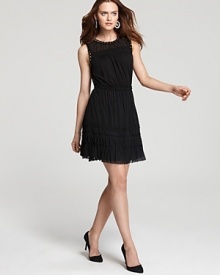 Uptown polish meets downtown edge as gleaming studs punctuate a pleated Juicy Couture dress. For the ultimate style mix, slip a leather jacket over the sheer silhouette. Uptown polish meets downtown edge as gleaming studs punctuate a pleated Juicy Couture dress. For the ultimate style mix, slip a leather jacket over the sheer silhouette.
