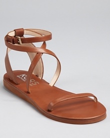 A low-key flat sandal for warm-weather adventures. From KORS Michael Kors.