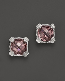 Brilliant raspberry crystal is framed in sterling silver on these timeless Judith Ripka studs.