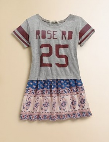 She'll take a cue from the boys in this colorful print dress topped with a sporty jersey tee.ScoopneckPull-on style with two functional back buttonsShort sleevesFull skirtCottonMachine washImported She'll take a cue from the boys in this colorful print dress topped with a sporty jersey tee.ScoopneckPull-on style with two functional back buttonsShort sleevesFull skirtCottonMachine washImported