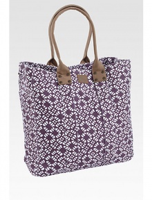 A graphic floral printed is both sweet and sophisticated, printed on sturdy cotton for this roomy tote.Magnetic snap closureLeather double handlesInside zip pocketsComplementary striped lining17½H X 16½W X 6¼DCottonSpot cleanImported A graphic floral printed is both sweet and sophisticated, printed on sturdy cotton for this roomy tote.Magnetic snap closureLeather double handlesInside zip pocketsComplementary striped lining17½H X 16½W X 6¼DCottonSpot cleanImported