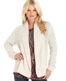 Snuggle into this Calvin Klein Jeans cardigan, featuring lush cable-knit and a cozy shawl collar.