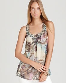 Send your summer style on a exotic escape with this Shiloh770 tank boasting a vibrant blaze of snakeskin print. Intricate metallic embellishment accents the neckline for a global-traveler aesthetic. Send your summer style on a exotic escape with this Shiloh770 tank boasting a vibrant blaze of snakeskin print. Intricate metallic embellishment accents the neckline for a global-traveler aesthetic.