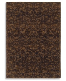 Crafted to impart a vintage wear and lush visual texture, this Karastan rug features subtle fabric-like patterning inspired by the organic designs found in granite and marble. Machine woven from 100% wool in a rich espresso hue. Crafted to impart a vintage wear and lush visual texture, this Karastan rug features subtle fabric-like patterning inspired by the organic designs found in granite and marble. Machine woven from 100% wool in a rich espresso hue.