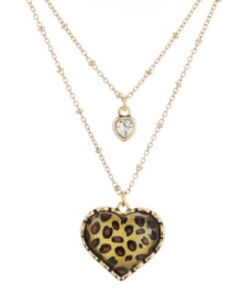 Animal magnetism. Just as leopard prints are all the rage in apparel at the moment, Betsey Johnson interprets the trend in necklace form. Featuring two heart-shaped emblems and a double-row design, it's crafted in gold tone mixed metal. Includes a signature gift box. Approximate length: 16 inches + 3-inch extender. Approximate drop: 1 inch.