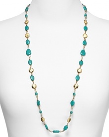 Embellished with striking turquoise beads and hammered stations, Lauren Ralph Lauren's link necklace is a striking adornment. Layer it over a crisp collar for a cool contrast.