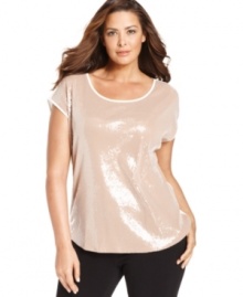 Let your style shine this season with Calvin Klein's short sleeve plus size top, showcasing a sequined front.