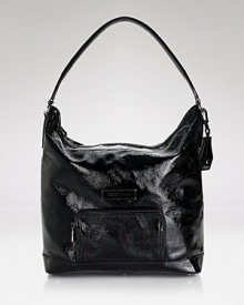 Effortless French style goes glossy with this patent leather hobo bag from Longchamp. Designed for day-to-night ease, its glamour simplified. Effortless French style goes glossy with this patent leather hobo bag from Longchamp. Designed for day-to-night ease, its glamour simplified.