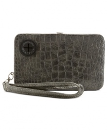 Fab meets function in this posh, croc-embossed wristlet case from Kenneth Cole Reaction that discretely stashes a music player or phone. Provides portal for ear buds so can grove on-the-go, and separate compartments let you bring along cards, cash, coins and ID. Fab meets function in this posh, croc-embossed wristlet case from Kenneth Cole Reaction that discretely stashes a music player or phone. Provides portal for ear buds so can grove on-the-go, and separate compartments let you bring along cards, cash, coins and ID.