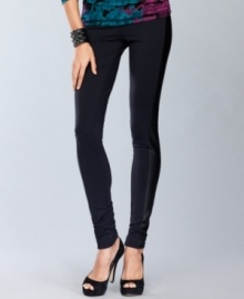 Fabulous faux leather takes the place of traditional tuxedo stripes on INC's sleek leggings. A perfect way to add a little edge to any casual look.