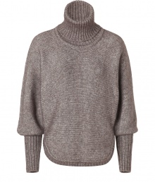 Exquisitely soft and equally chic, Antonia Zanders oversized turtleneck pullover lends a cool modern finish to every outfit - Ribbed turtleneck, long bishop sleeves, ribbed cuffs, rounded hemline, cabled back - Straight silhouette - Team with chunky jewelry and figure-hugging skinny trousers