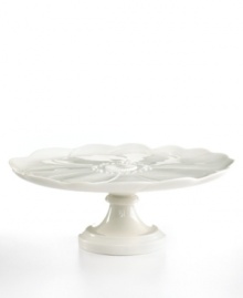 Beautifully formed anemone petals in white porcelain make this figural cake stand from Martha Stewart Collection a charming way to refresh your favorite confections. Beautifully formed anemone petals in white porcelain make this figural cake stand from Martha Stewart Collection a charming way to refresh your favorite confections.