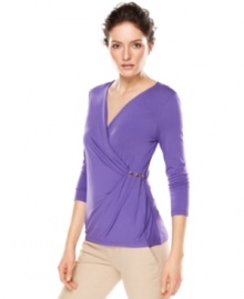 Stud hardware adds edge to this Calvin Klein top for a stylish spring staple! Stud hardware adds edge to this Calvin Klein top for a stylish spring staple!