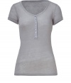 Amp up your casual basics with this easy-to-style flattering short sleeve henley from Majestic - Scoop neck, front button half placket, short sleeves, slim fit - Pair with skinnies, a draped cardigan, and platform booties or with denim cut-offs and platform sandals for a casual warm weather look