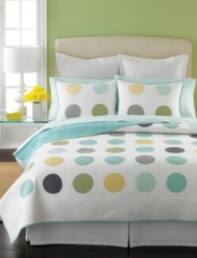 Pops of perfect hues create a minimalistic look in this quilt from Martha Stewart Collection. Its pure white cotton ground is quilted with a mosaic of circles while playful blues, yellows, greens and grays offer a prim, modern look. The reverse provides a solid design alternative.